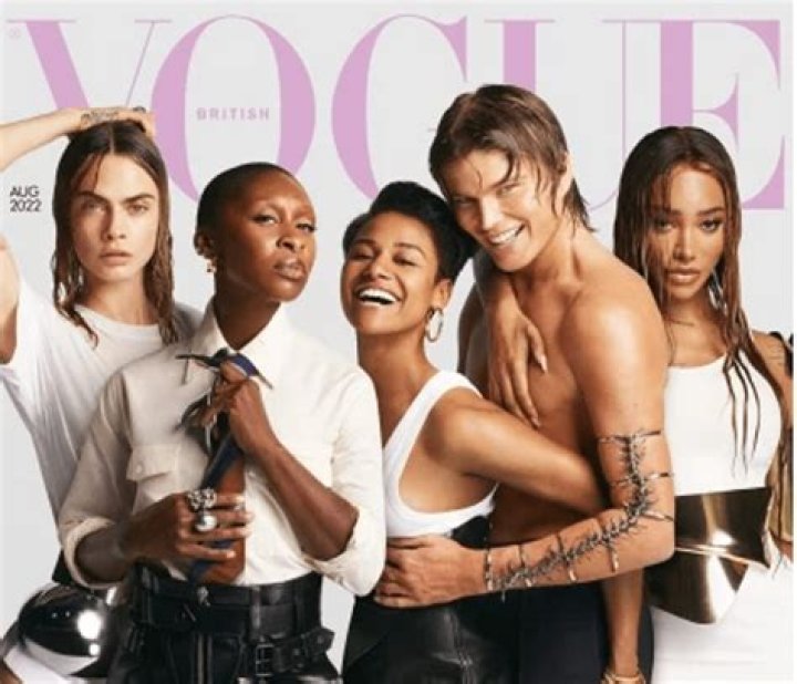 British supermodel Cara Delevingne posed topless for the August issue of British Vogue