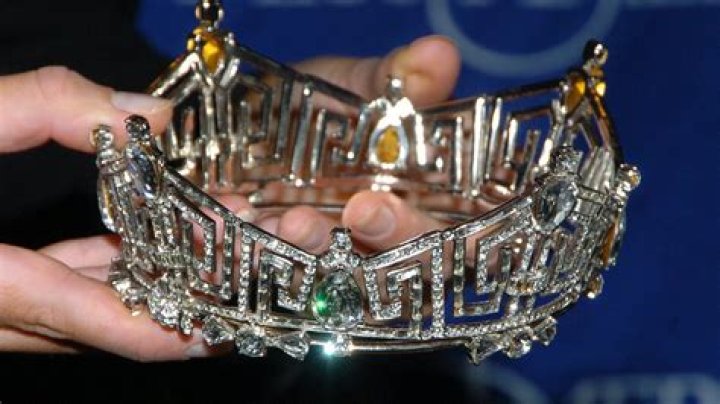 Crazed husband of beauty pageant runner-up slams winner’s crown to the floor in a fit of rage