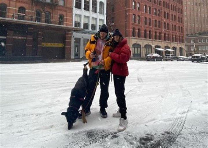 Emily Ratajkowski And Husband Sebastian Bear-McClard Play In The Snow With Colombo