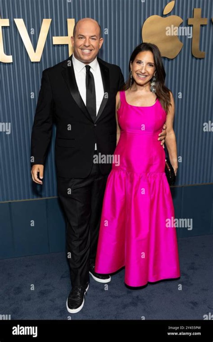 What does Brian Stelter's wife do for a living?