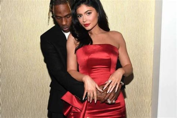 Kylie Jenner Turns Head In Stunning Red Dress In Photos With Travis Scott At Clive Davis’ Party