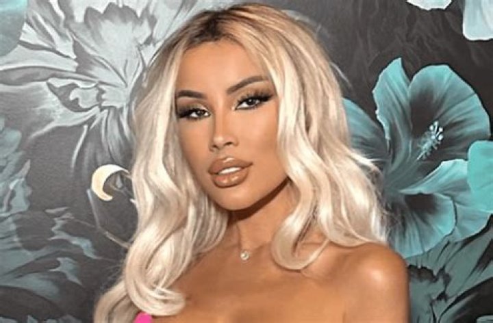 Lisa Opie Shares Swimsuit Photo as "Ice Princess"