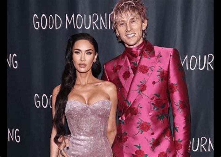 Machine Gun Kelly and Megan Fox in a dress with a defiant neckline at the premiere in Hollywood