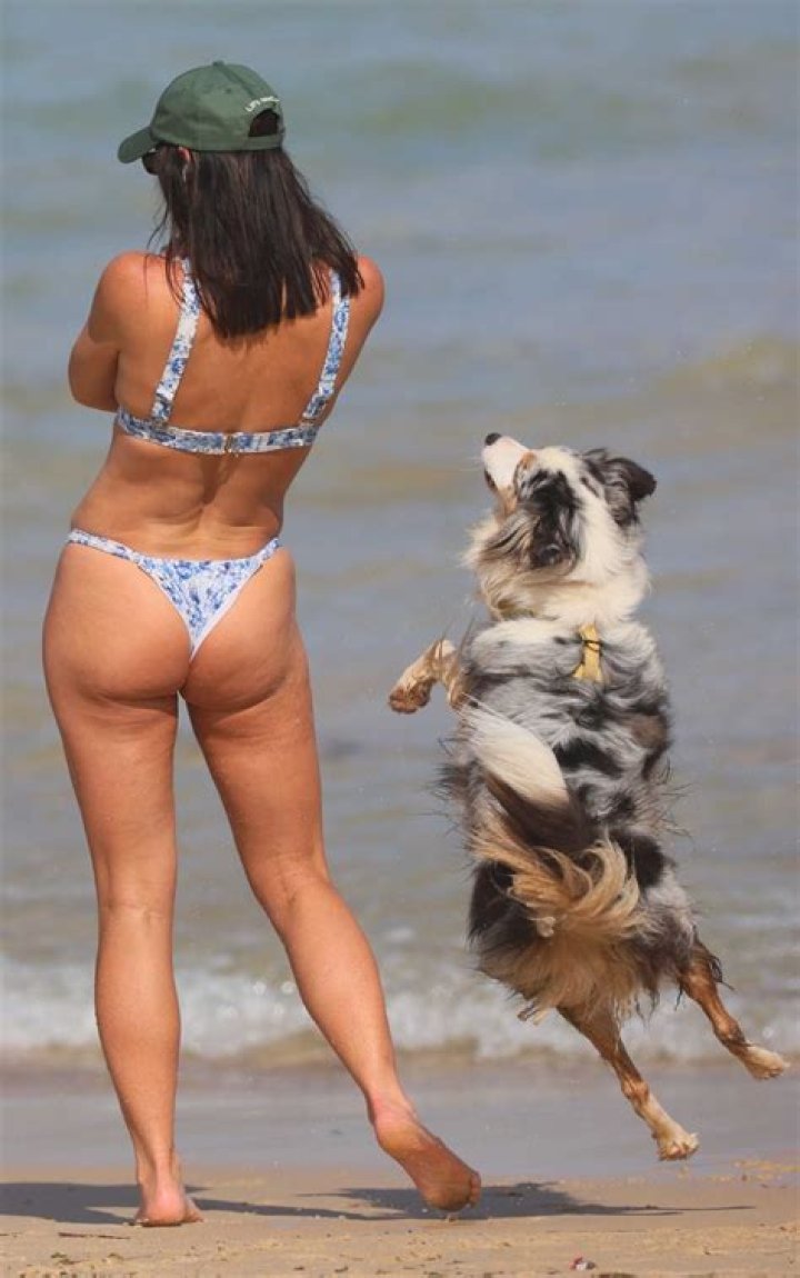 Brittany Hockley in Bathing Suit Smooches Her Dog Deliah — Celebwell