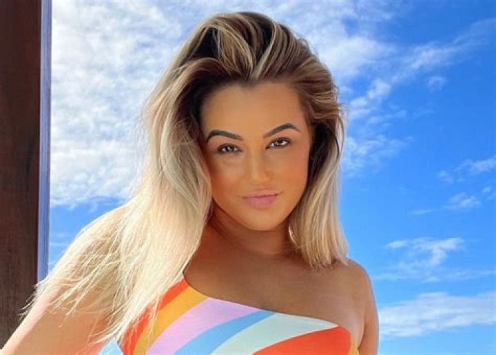 Karina Irby in Bathing Suit Agrees to “Let’s Just Run Away and Get Married!” — Celebwell