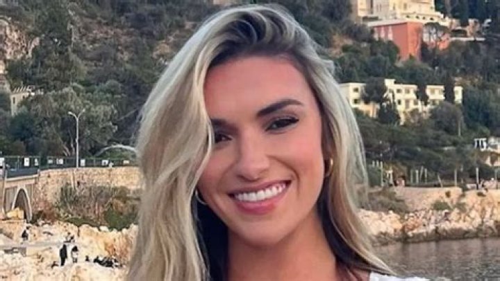 Volleyball Star Kayla Simmons Shows Off Flat Tummy on "Perfect Day"